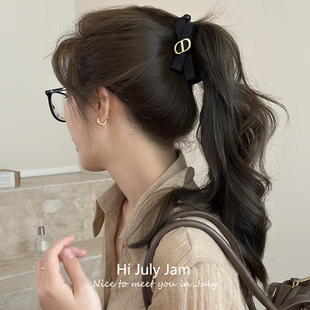 韩系小众黑色猪鼻子蝴蝶结香蕉夹女竖式 后脑勺扭扭夹 夹子网红新款