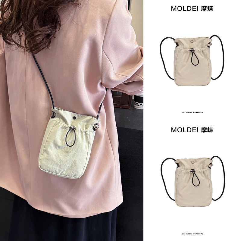 秋季冬季迷你小包包女2024新款时尚抽绳斜挎手机包白色单肩钥匙包,箱包皮具/热销女包/男包,手机包,淘宝优惠券,粉丝福利购,淘宝优惠卷