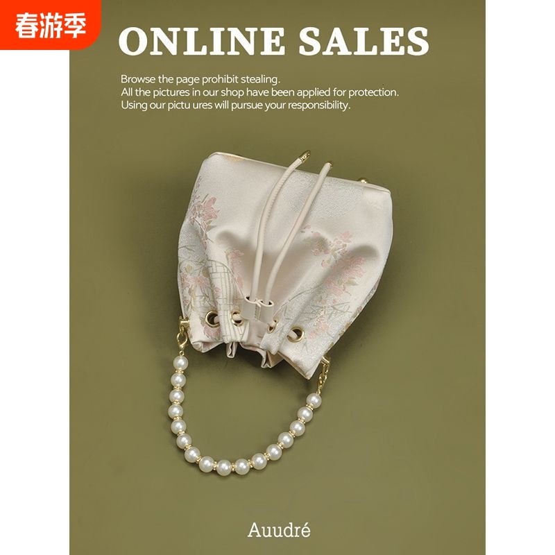 2025新款新中式国风珍珠手提水桶包包女式链条斜挎包百搭小拎包