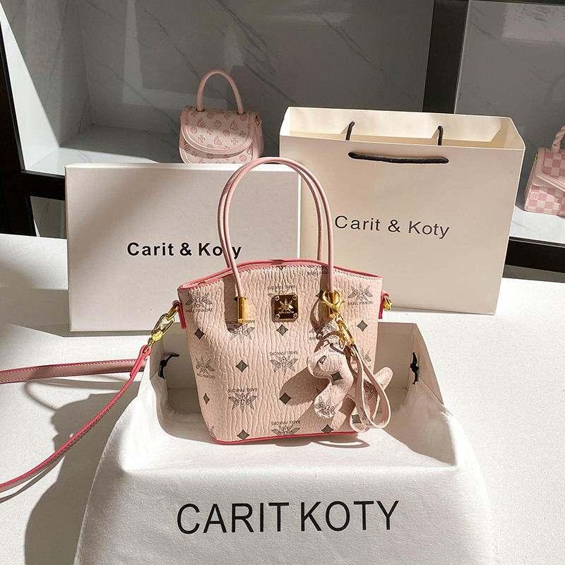 粉色小众印花菜篮子包包2025新款感通勤水桶包