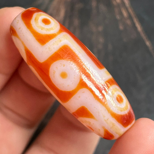 藏传西藏高油包浆红肉九眼莲花大鹏鸟天珠 文玩配饰 顶珠勒子腰珠