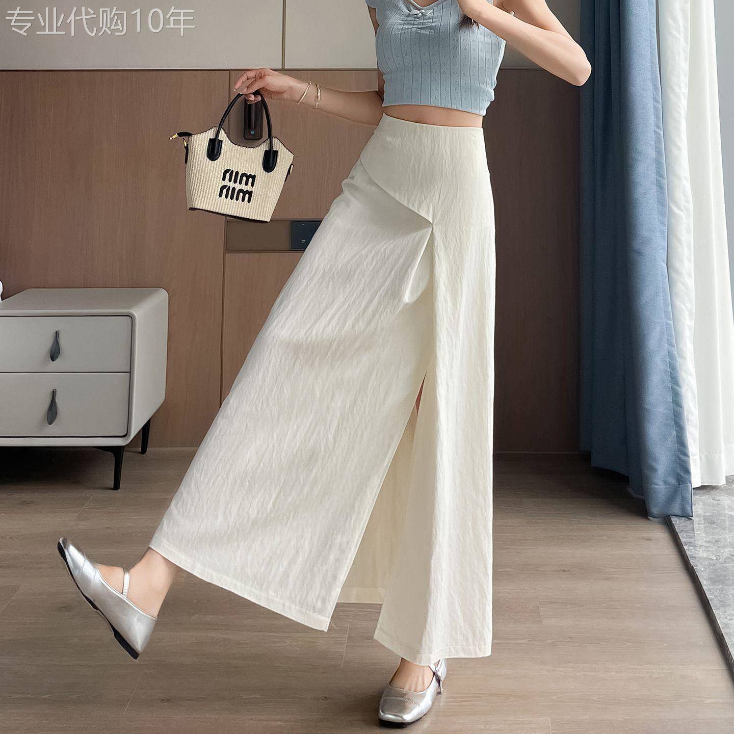 杏色开叉半身裙女夏季薄款设计感不规则天丝棉麻高腰a字中长裙子