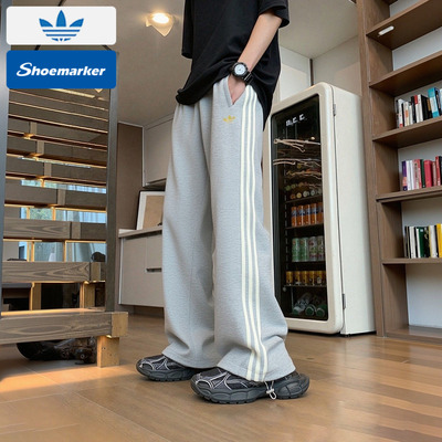 阿迪达斯三叶草灰色运动裤男裤2025冬宽松针织直筒休闲长裤KT0653
