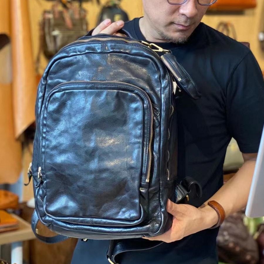 牛皮通勤双肩包通勤包