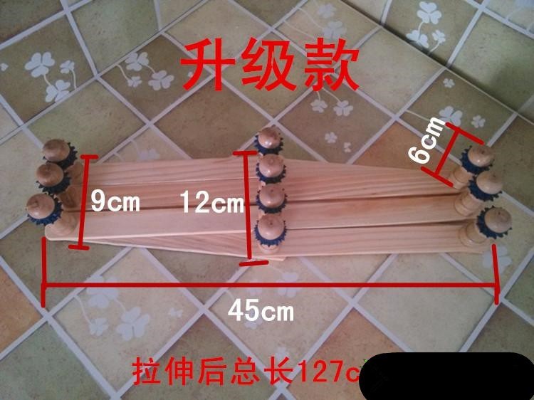 门后墙壁挂钩原木伸缩衣架