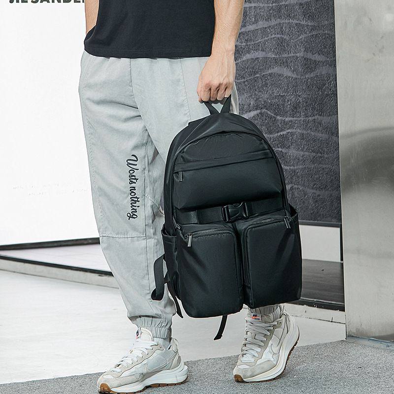 男士双肩包男潮牌轻便大学生书包