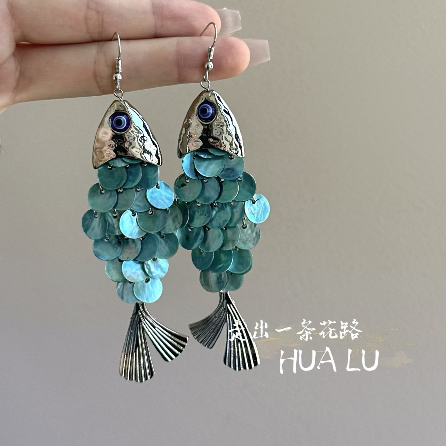 HUALU-鱼戏浪花~蓝色海边度假风图片