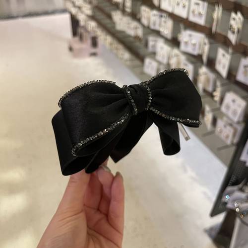 水钻镶边缎带蝴蝶结香蕉夹竖夹