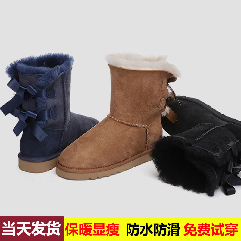 雪地靴女真皮皮毛一体中筒蝴蝶结冬季新款防滑保暖羊毛雪地棉加绒