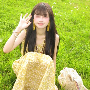 法式黄色无袖背心碎花吊带连衣裙女夏季2025新款海边度假气质长裙