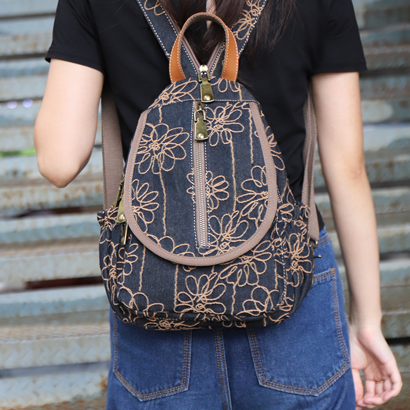 多隔层轻便牛仔布两用小背包