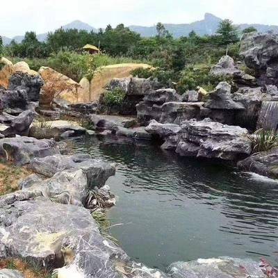 石场供应大量太湖石原石驳岸园林工程天然假山造景石黑太湖石