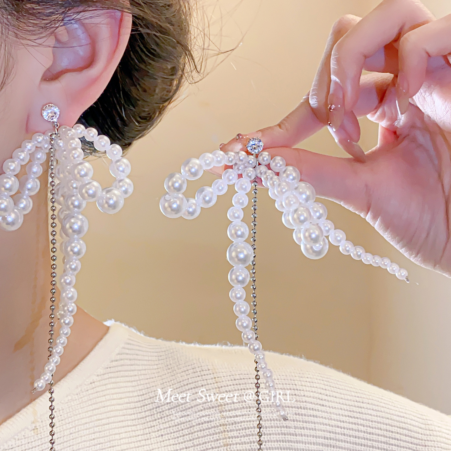 超显白珍珠串珠蝴蝶结耳环