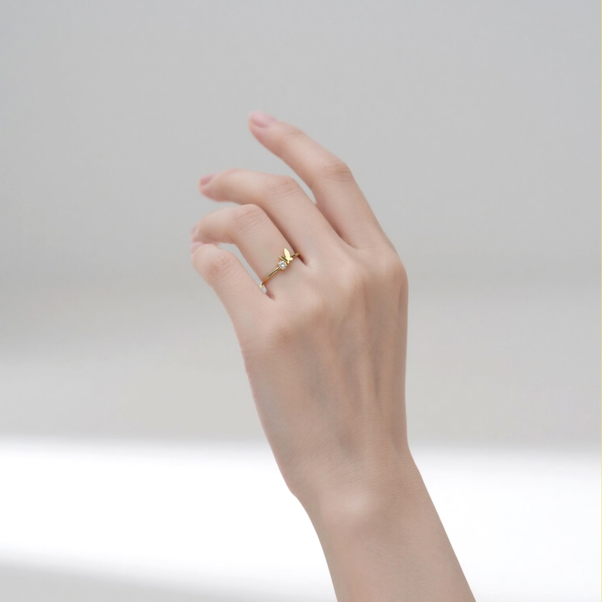 18k金单钻小蝴蝶戒指女款