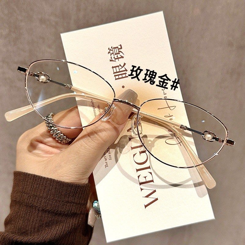 58166气质质感合金椭圆框近视眼镜女设计感级奶茶金平光镜