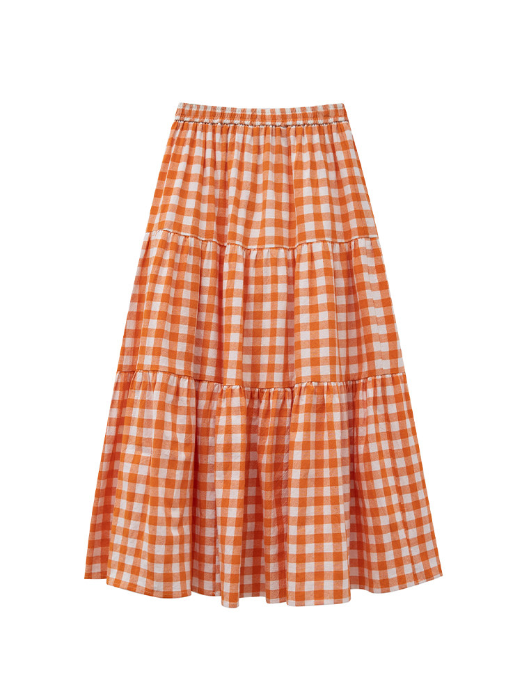 Orange and white gingham tiered skirt on a white background