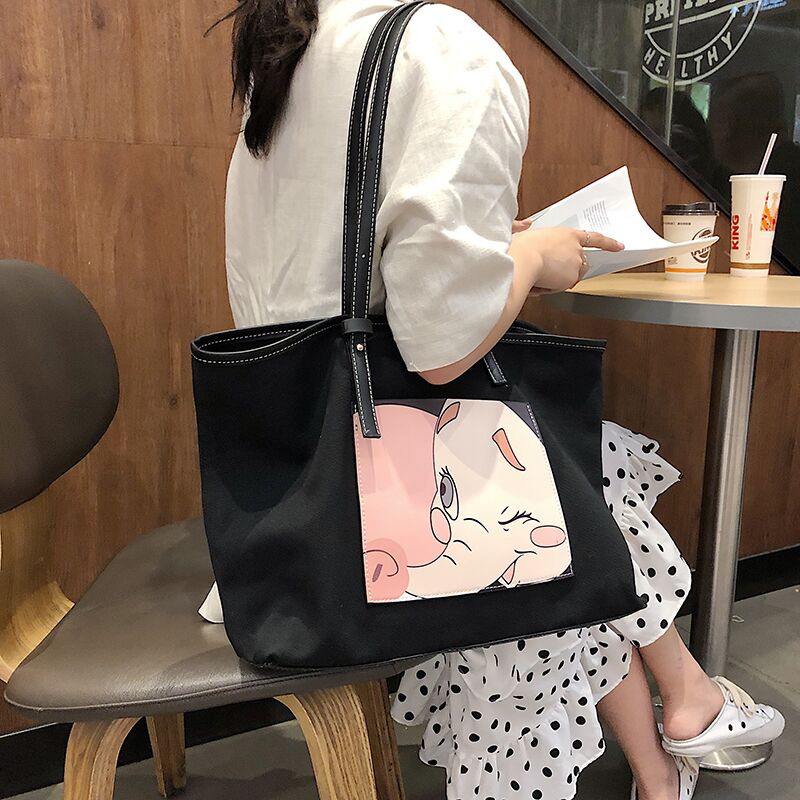 热销54件买三送一2019新款小象女斜跨简约帆布包包