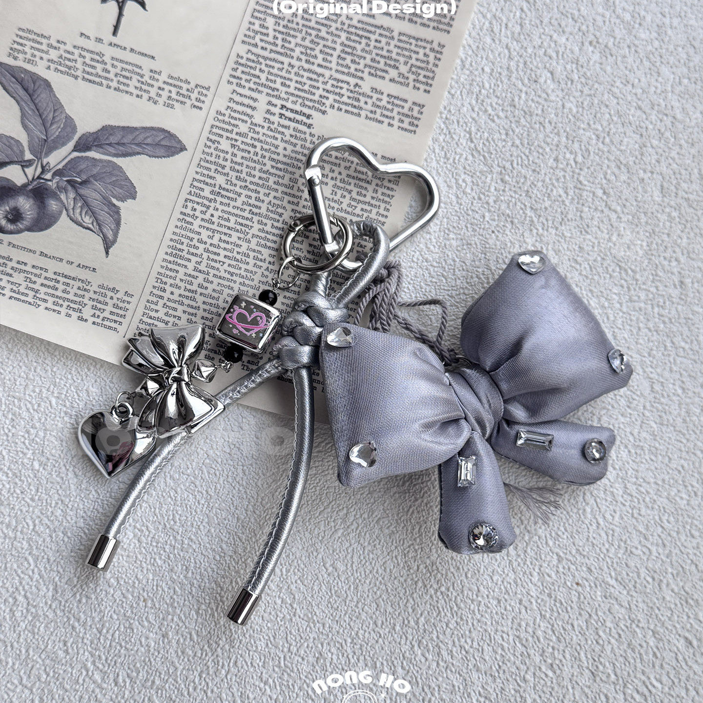 原创小众设计银色蝴蝶结包挂件