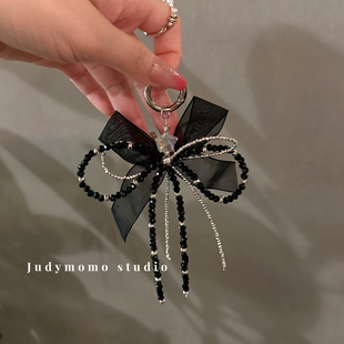 ins黑色碎银子辣妹蝴蝶结手机链适用苹果手机壳通用挂链条少女潮