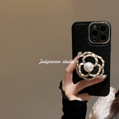 ins气质黑小香山茶花支架适用iPhone15手机壳16promax苹果12 13硅胶11黑色皮纹软壳