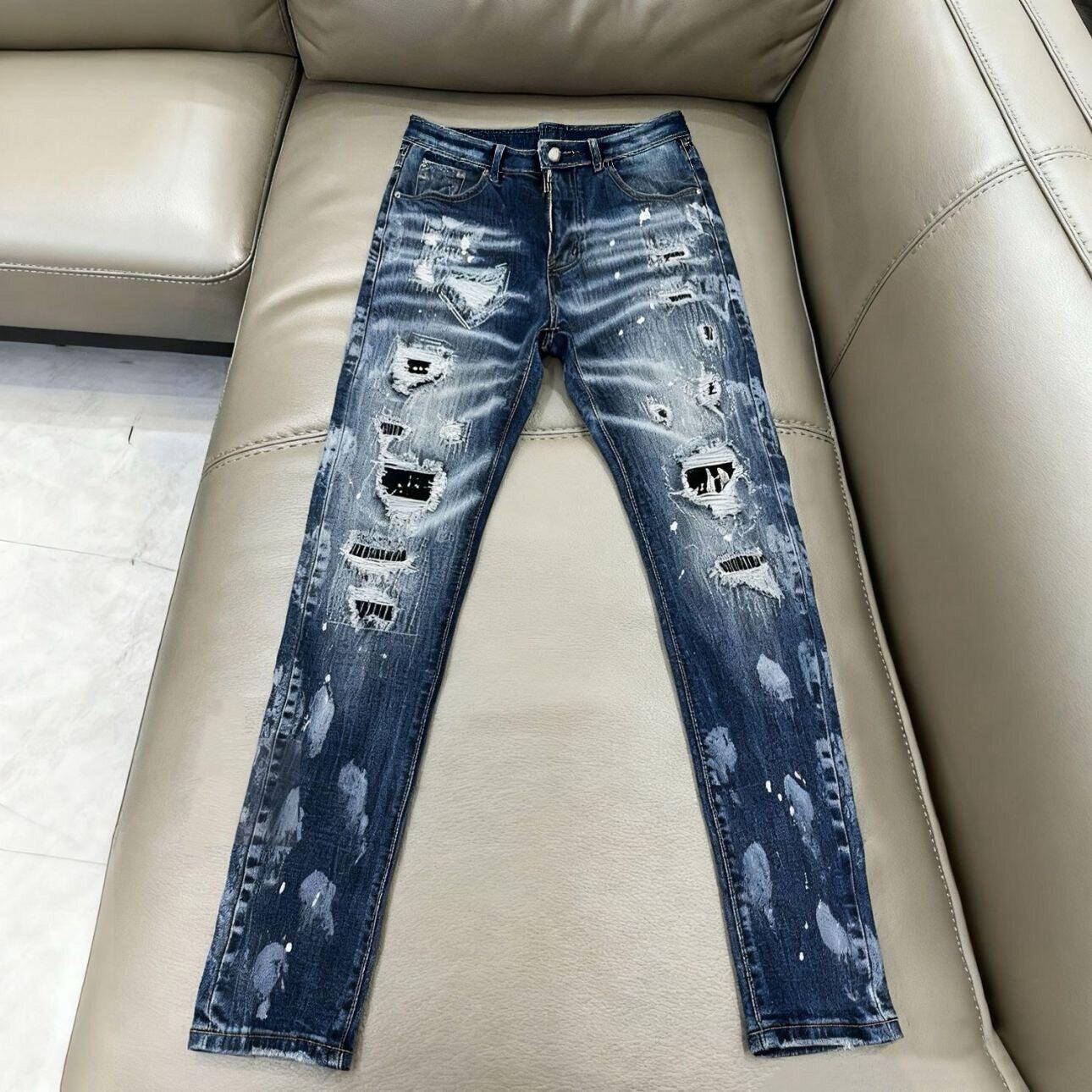 am新款潮牌蓝色个性破洞补丁泼墨牛仔裤男士潮流修身小脚弹力裤子