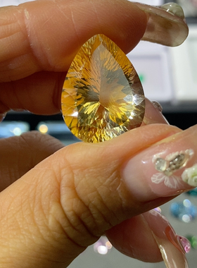 天然黄水晶裸石21.42克拉全净无瑕千禧切割火彩非常好