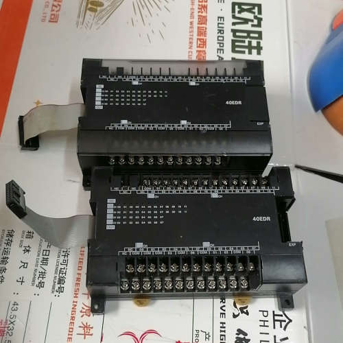 欧姆龙CP1W-40EDR，拆机，成色如图所示 ，功能正常包