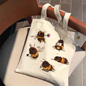 休闲可爱蜜蜂印花帆布托特包购物袋女士手提包大容量单肩包 时尚
