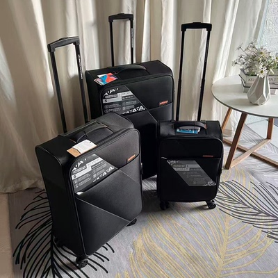 美国旅行者可扩展布万向轮行李箱