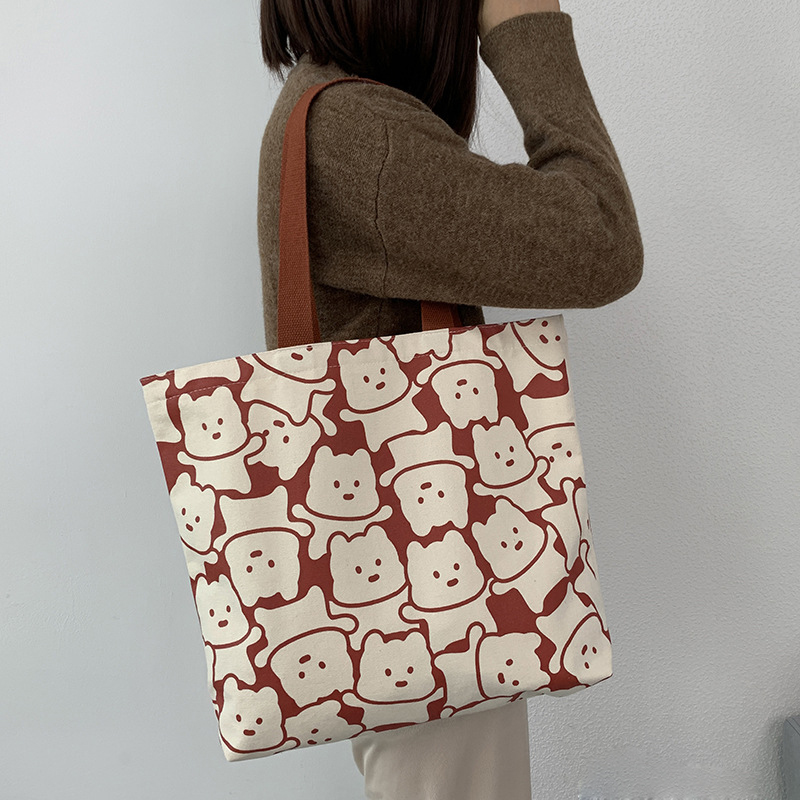 帆布包女夏文艺布袋包大学生大容量手提单肩包上课通勤包小众包包