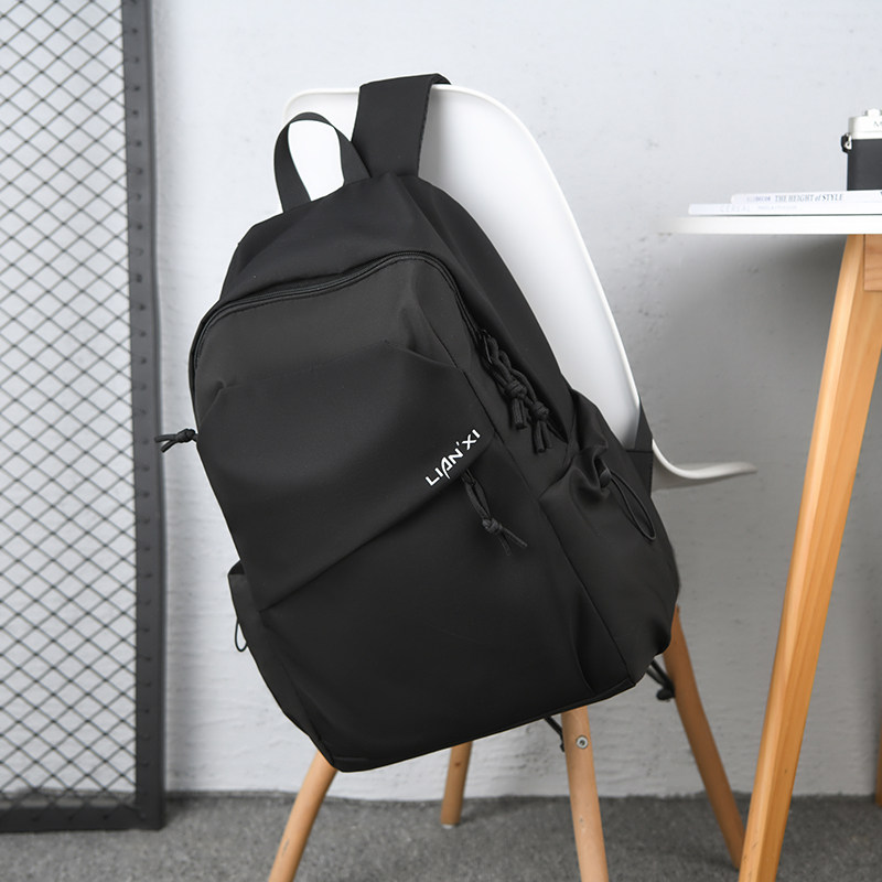 新款双肩包男中学生书包旅行包