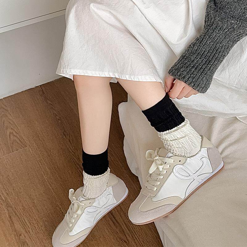 黑白色拼接麻花纹袜子女春秋韩版配勃肯鞋时尚ins潮休闲中筒袜
