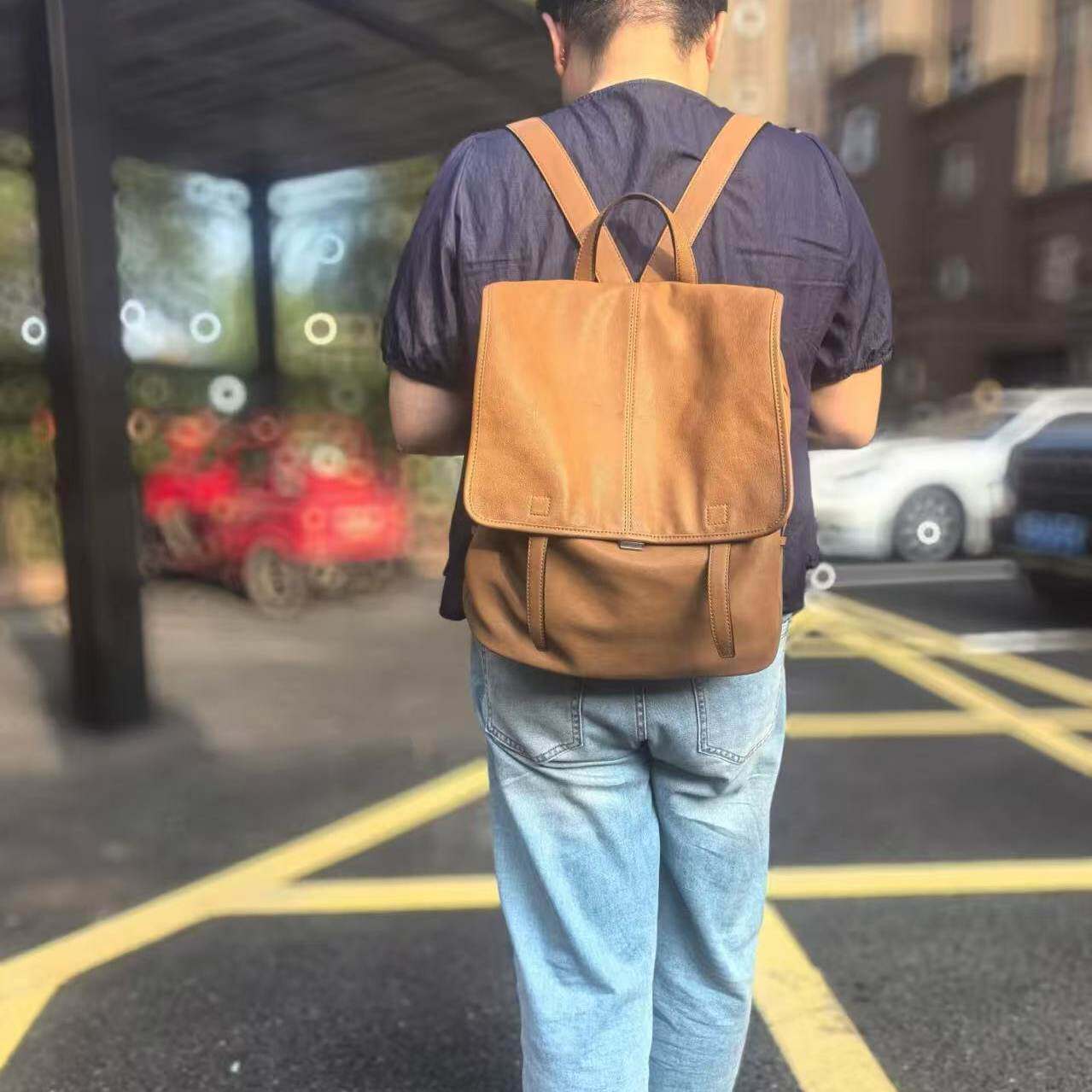 明星同款羊皮男女通用信使竖款徒步双肩包通勤商务旅行电脑包