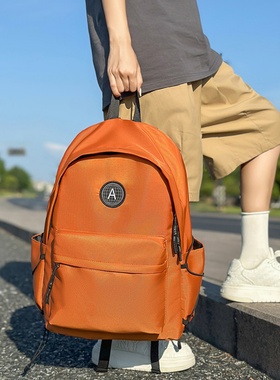 橙色双肩包男女大容量户外旅行背包大学生简约轻便休闲运动包书包