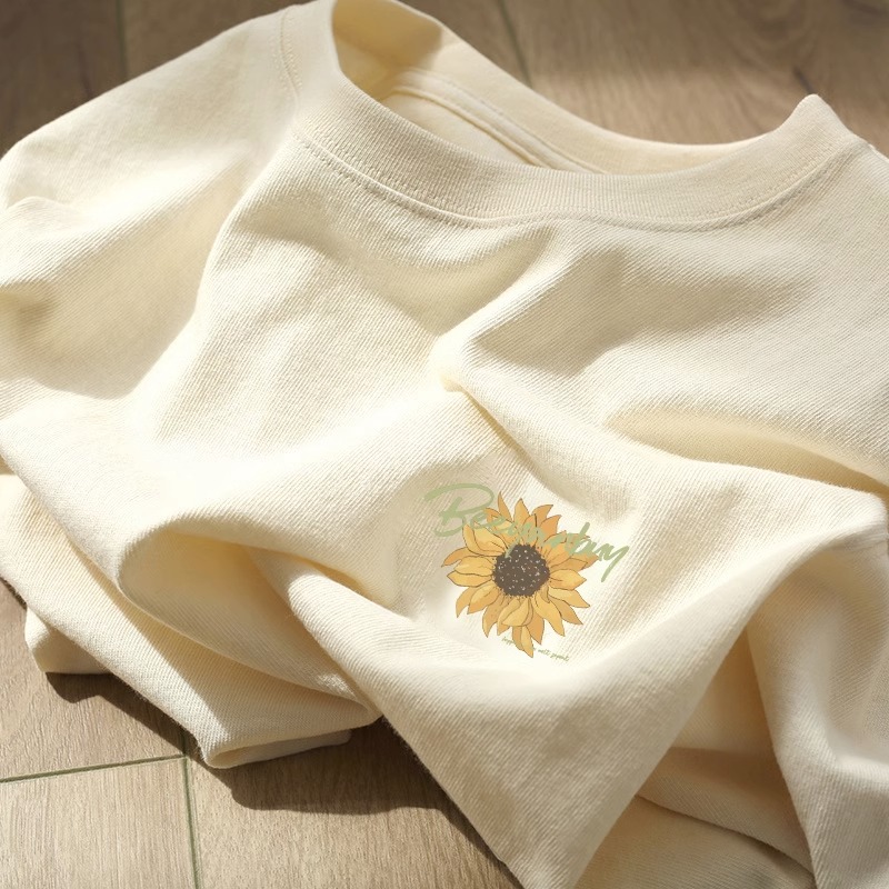 日系复古奶杏色短袖t恤女夏季设计感向日葵印花chic港味正肩上衣