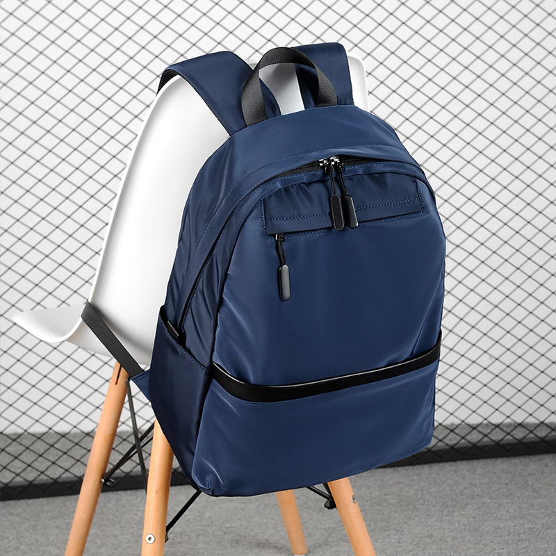 2022春夏新品大中学生书包背包休闲电脑包时尚质感男士双肩包
