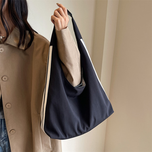 帆布包上班通勤新款上学手提袋休闲大容量托特时尚单肩包包女布包