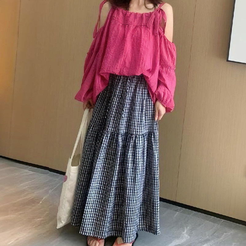 松紧腰格纹半身裙子女春秋复古2025新款显瘦黑白格子中长a字长裙