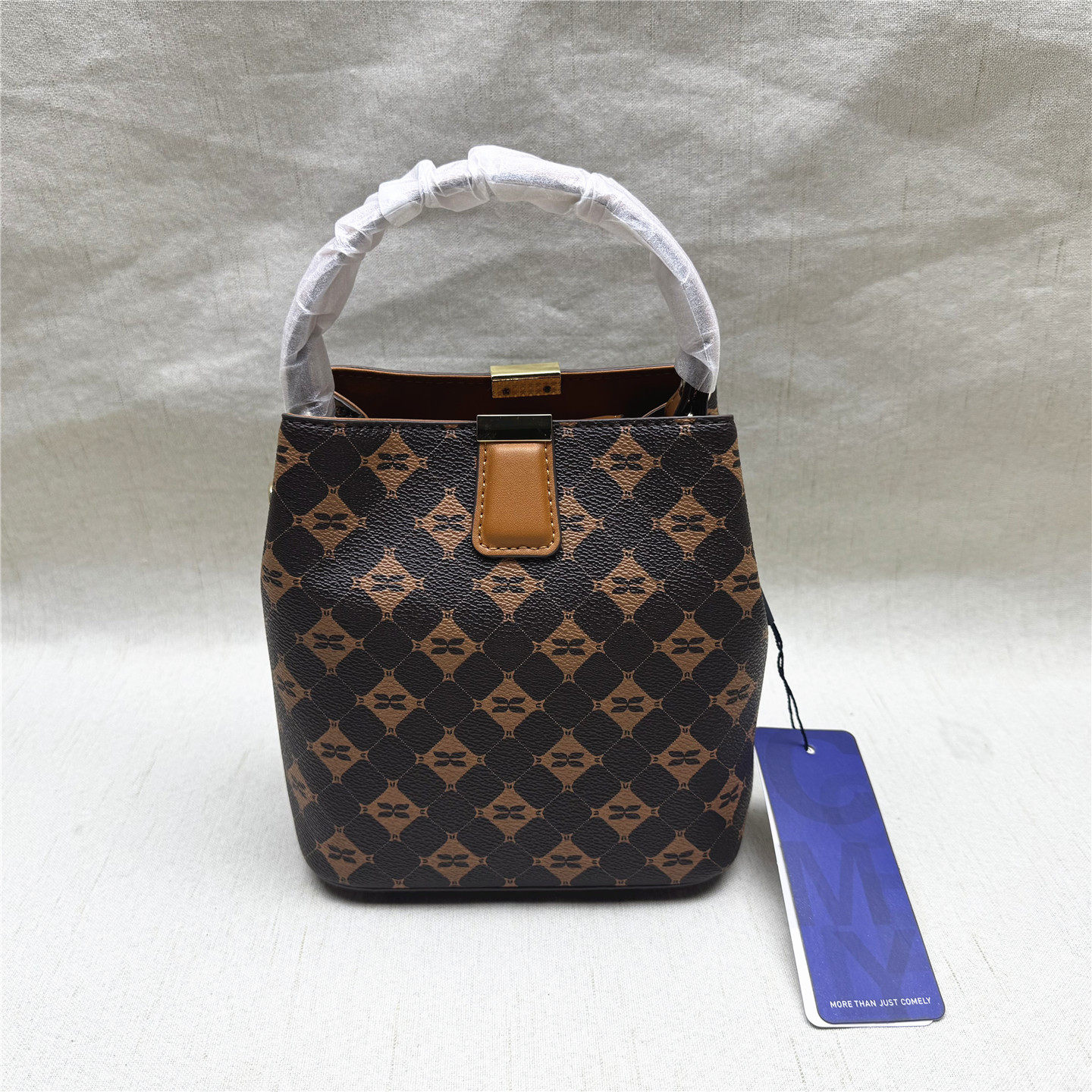 comely/康莉正品撤柜经典咖啡色单肩斜挎手提水桶包女新款包包,箱包皮具/热销女包/男包,水桶包,淘宝优惠券,粉丝福利购,淘宝优惠卷