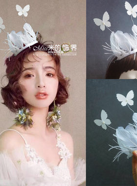 白色羽毛蝴蝶小皇冠女王摄影儿童