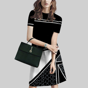 设计感撞色印花连衣裙女2026年夏季新款复古气质休闲短袖A字裙潮