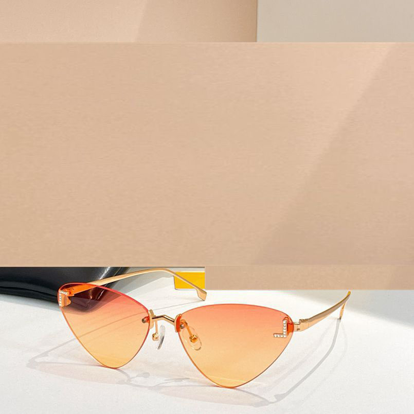 时尚猫眼金属无框太阳眼镜女士4085优雅镶钻遮阳墨镜男防紫外线橙