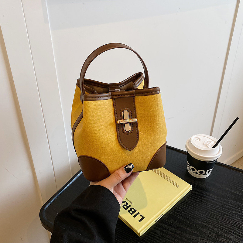 高颜值洋气减龄小包包女2025新款精致轻奢小众撞色斜挎手提水桶包,箱包皮具/热销女包/男包,水桶包,淘宝优惠券,粉丝福利购,淘宝优惠卷