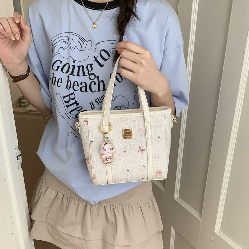小众设计可爱少女印花水桶包包女2026春新款百搭手提斜挎包高级感,箱包皮具/热销女包/男包,水桶包,淘宝优惠券,粉丝福利购,淘宝优惠卷