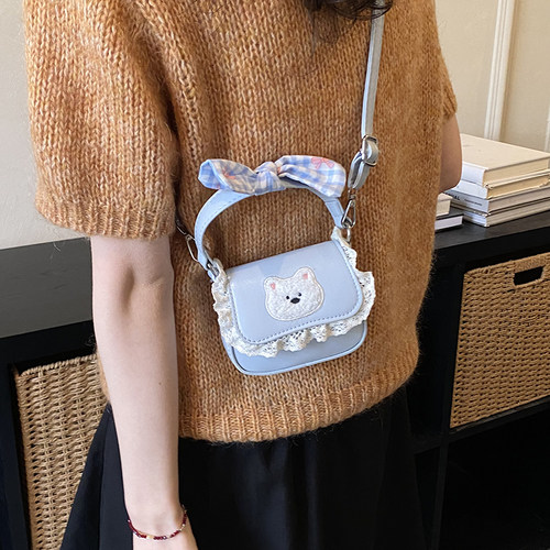 素韵格蓝色蝴蝶结迷你斜挎小方包