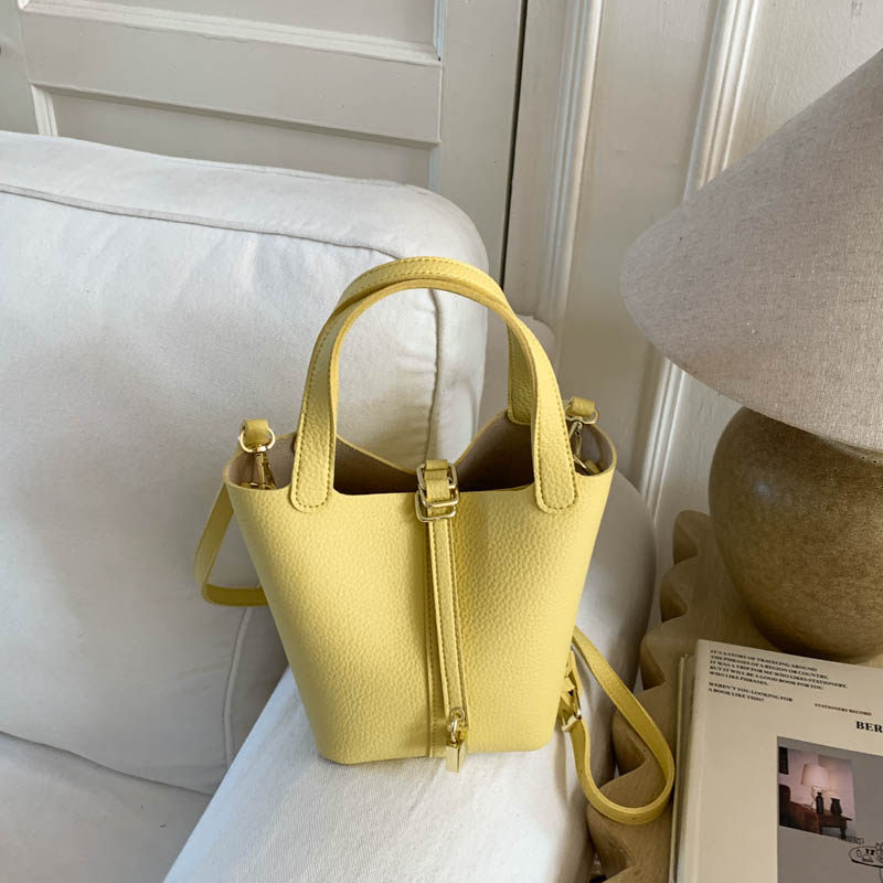 韩系洋气小拎包水桶包女2026新款简约手提斜挎包休闲通勤菜篮子包,箱包皮具/热销女包/男包,水桶包,淘宝优惠券,粉丝福利购,淘宝优惠卷