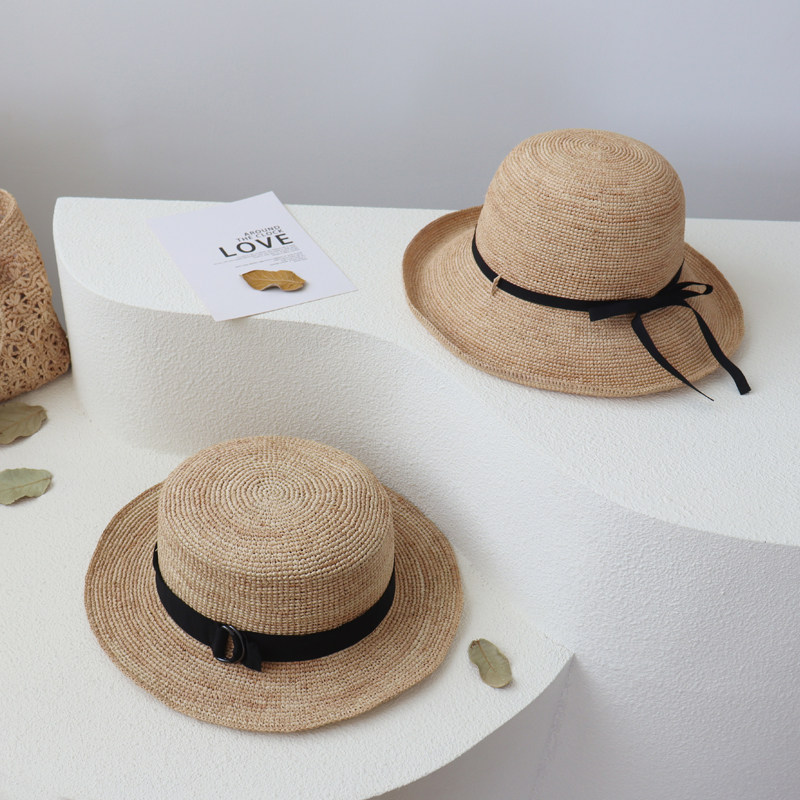 新品日系文艺蝴蝶结草帽拉菲草手工编织盆帽大帽檐遮阳渔夫帽度假