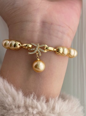 蝴蝶结施家珍珠手链女 南洋金色2025年新款轻奢小众精致手串叠戴