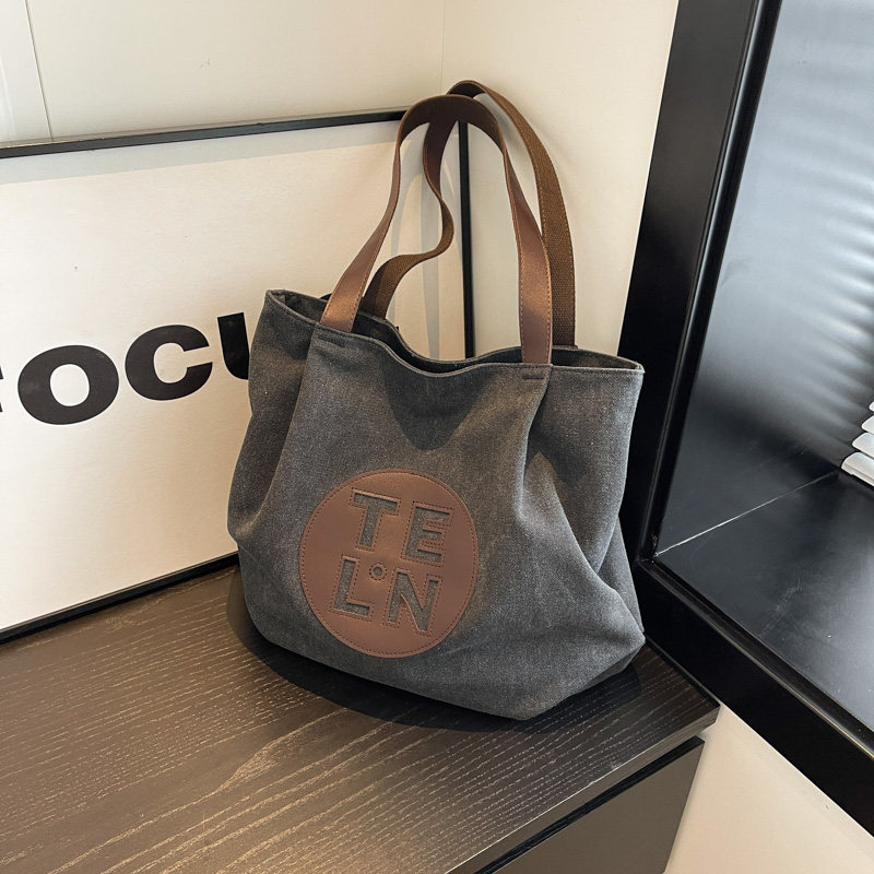 新款帆布包大容量大学生上课通勤加厚休闲托特包文艺高品质单肩包