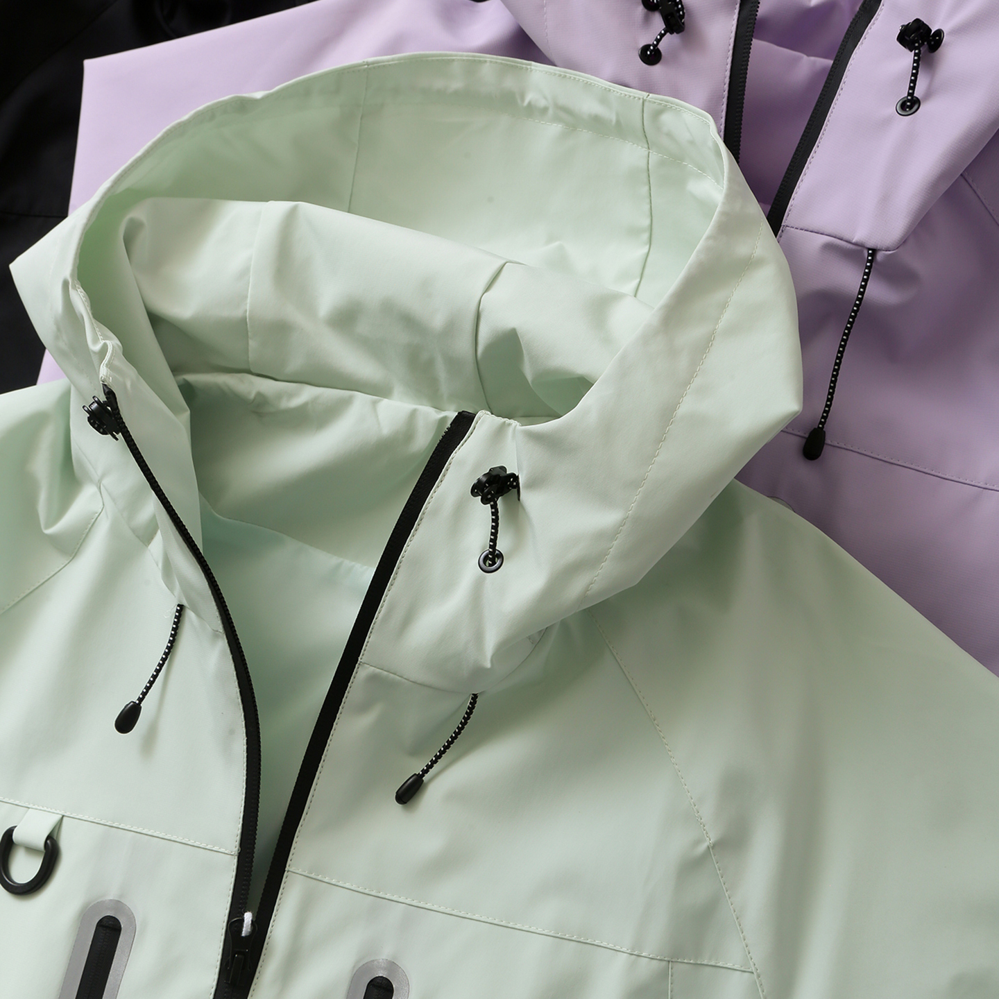 压胶女设计感清新连帽防水冲锋衣